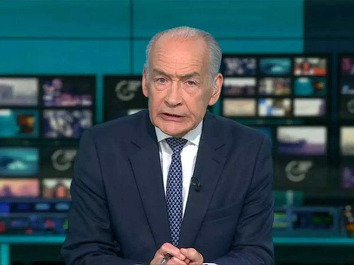 Alastair Stewart during a news broadcast facing health challenges with determination