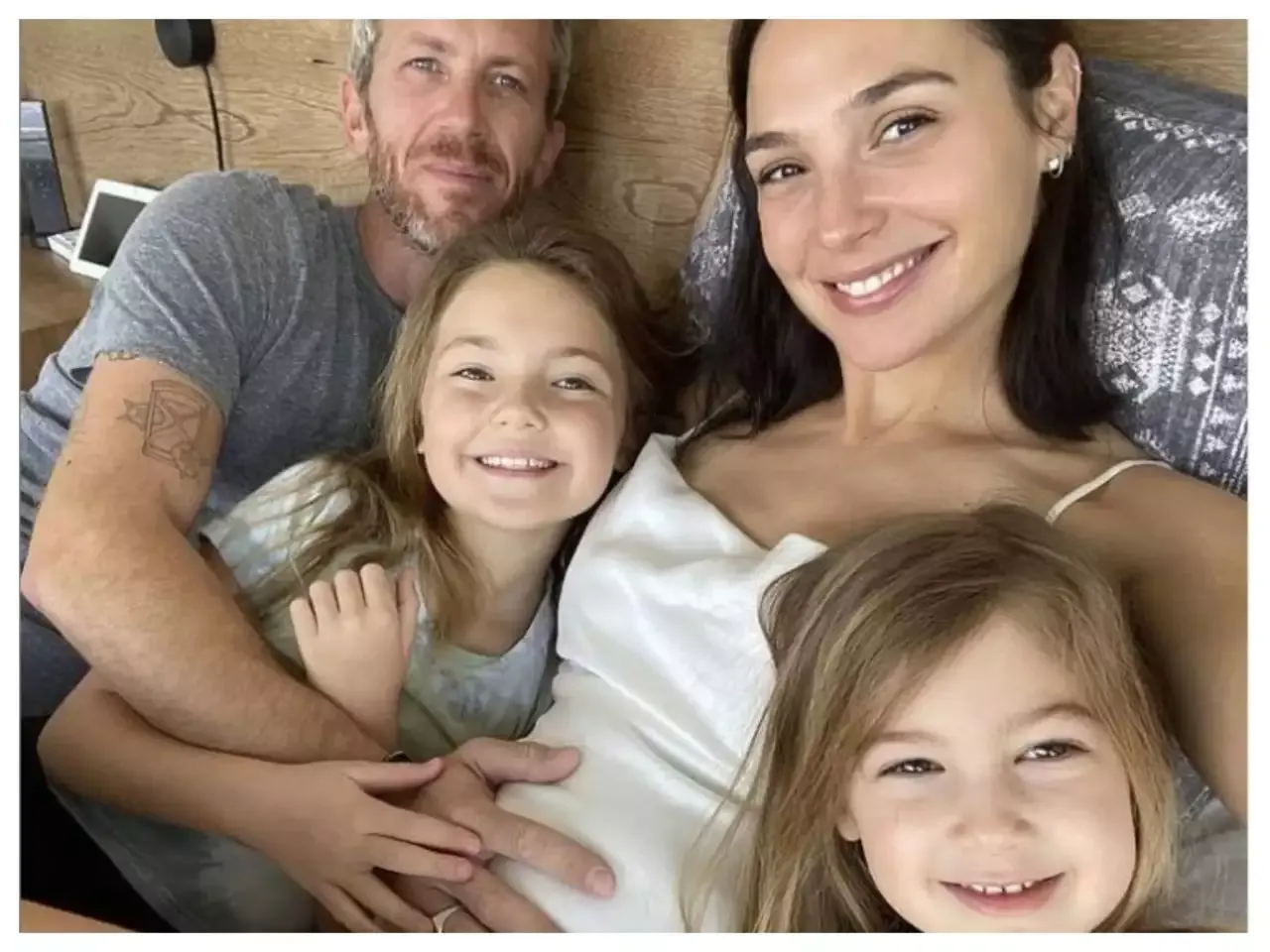 Gal Gadot sharing her baby bump photo with husband and daughters