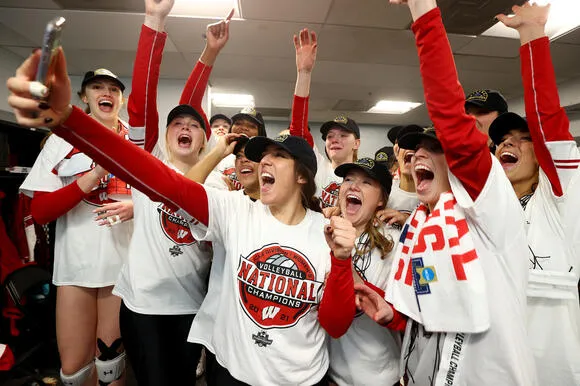 Giorgia Civita 7 of the Wisconsin Badgers calls her family in Italy after defeating the Nebraska Cornhuskers during the Division I Womens Volleyball Championship last December