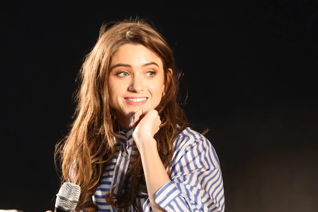 Natalia Dyer with her parents showcasing love and support